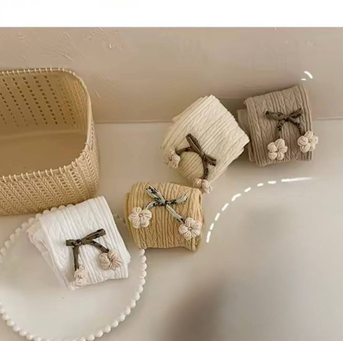 جوراب شلواری طرح شکوفه گل طلایی و پاپیون .......17530