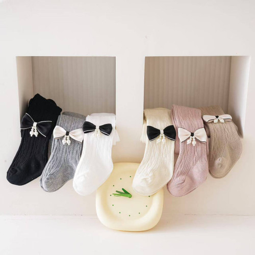 جوراب شلواری کبریتی طرح پاپیون و مروارید ...............................19407